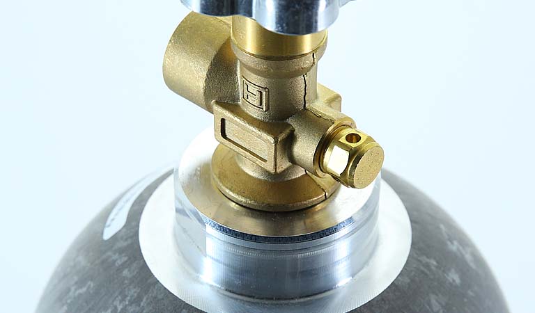 Specialty gas cylinder nozzle